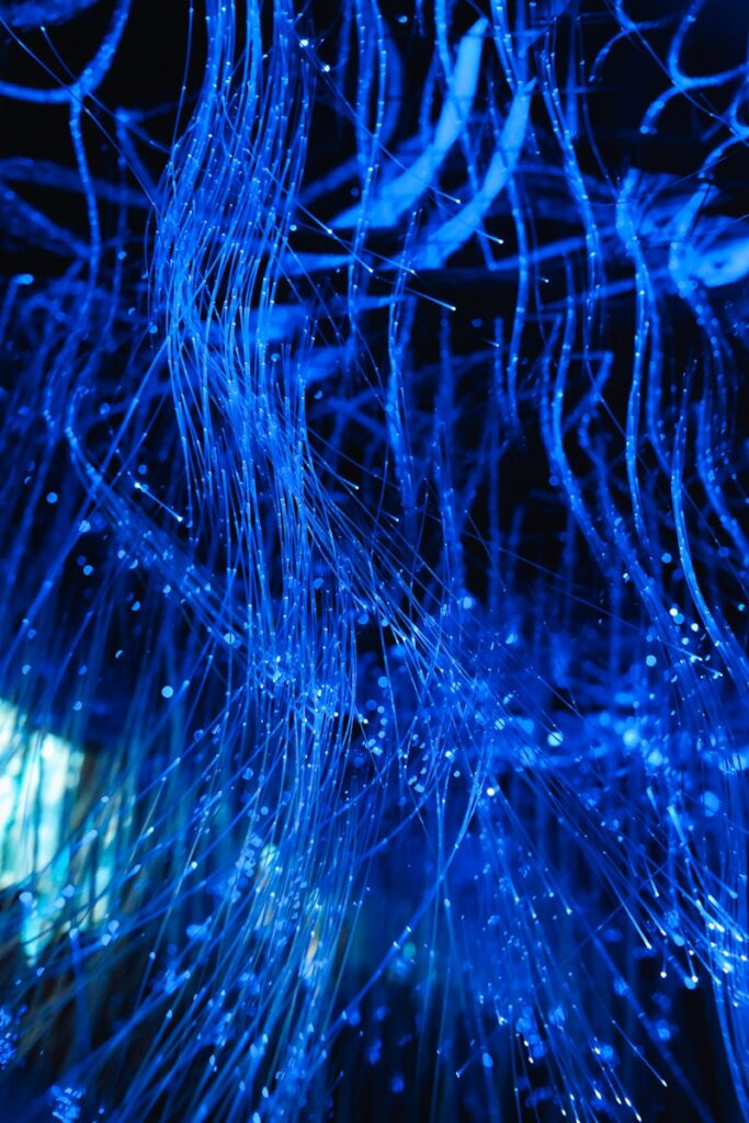 Abstract network mesh with blue lines representing cybersecurity
